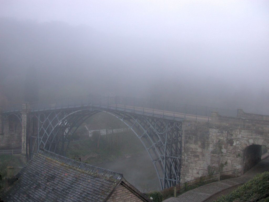 Bridge in early morning mist