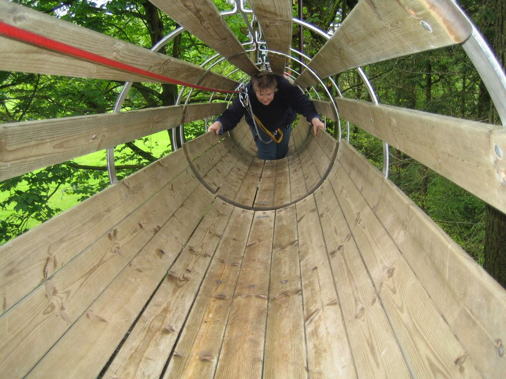 Debbie crawling along the suspended tube